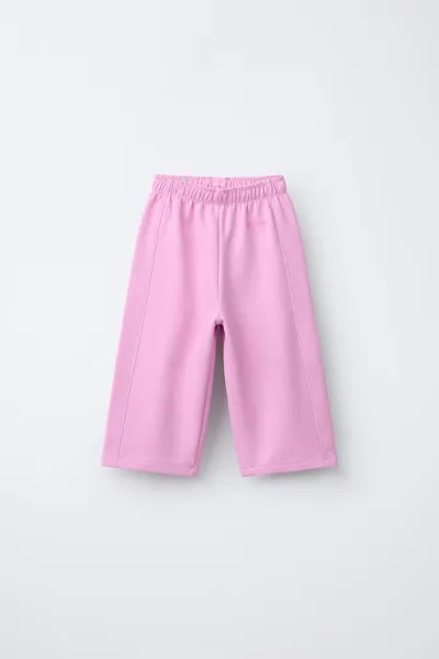 Брюки с широким кроем и рельефным слоганом, PINK / LILAC — фото 2