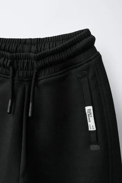 Брюки INTERLOCK JOGGERS, Чёрный — фото 5