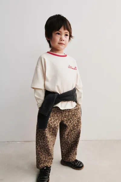 Брюки ANIMAL PRINT BAGGY TROUSERS